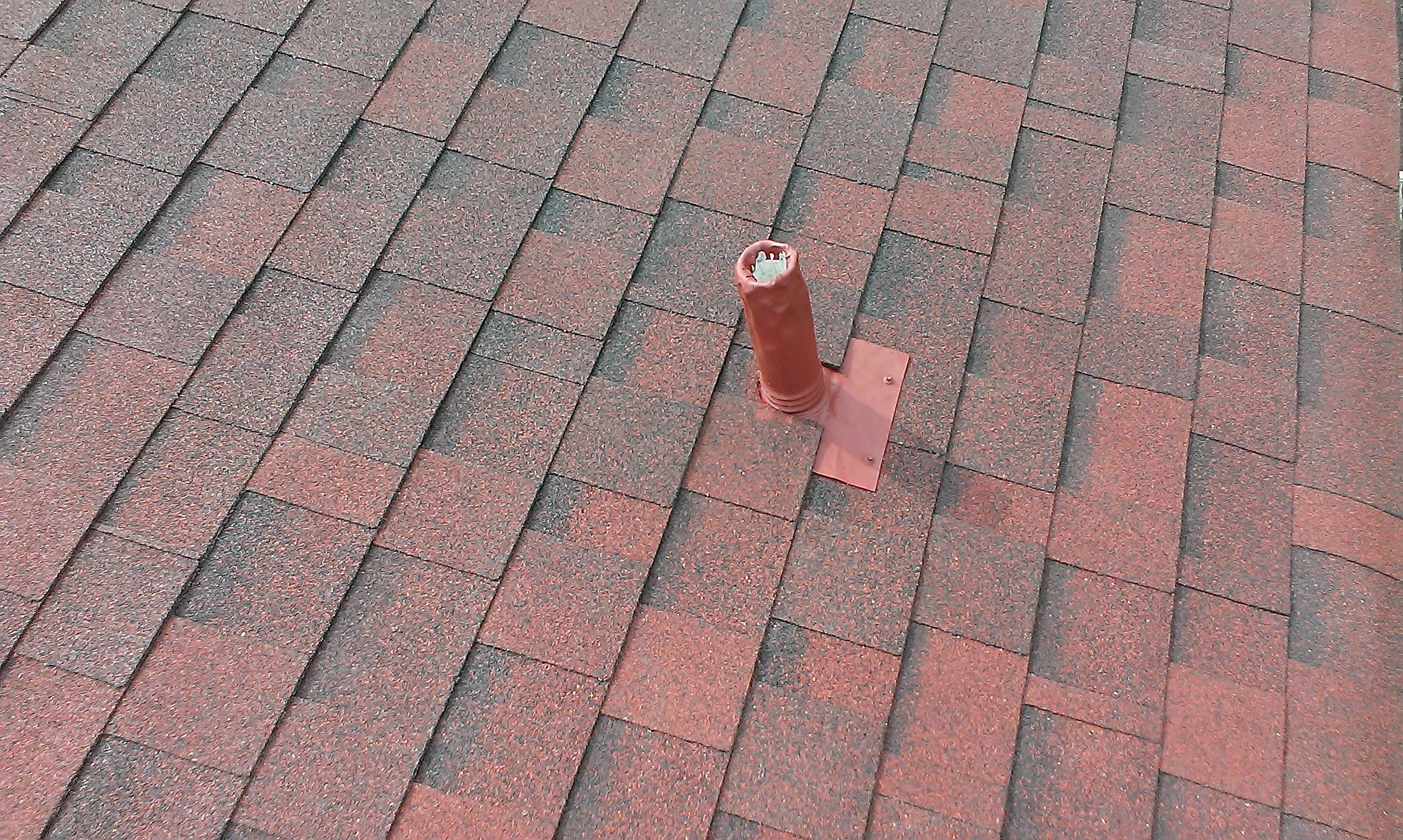 Worker Doing A Re-Roofing Service